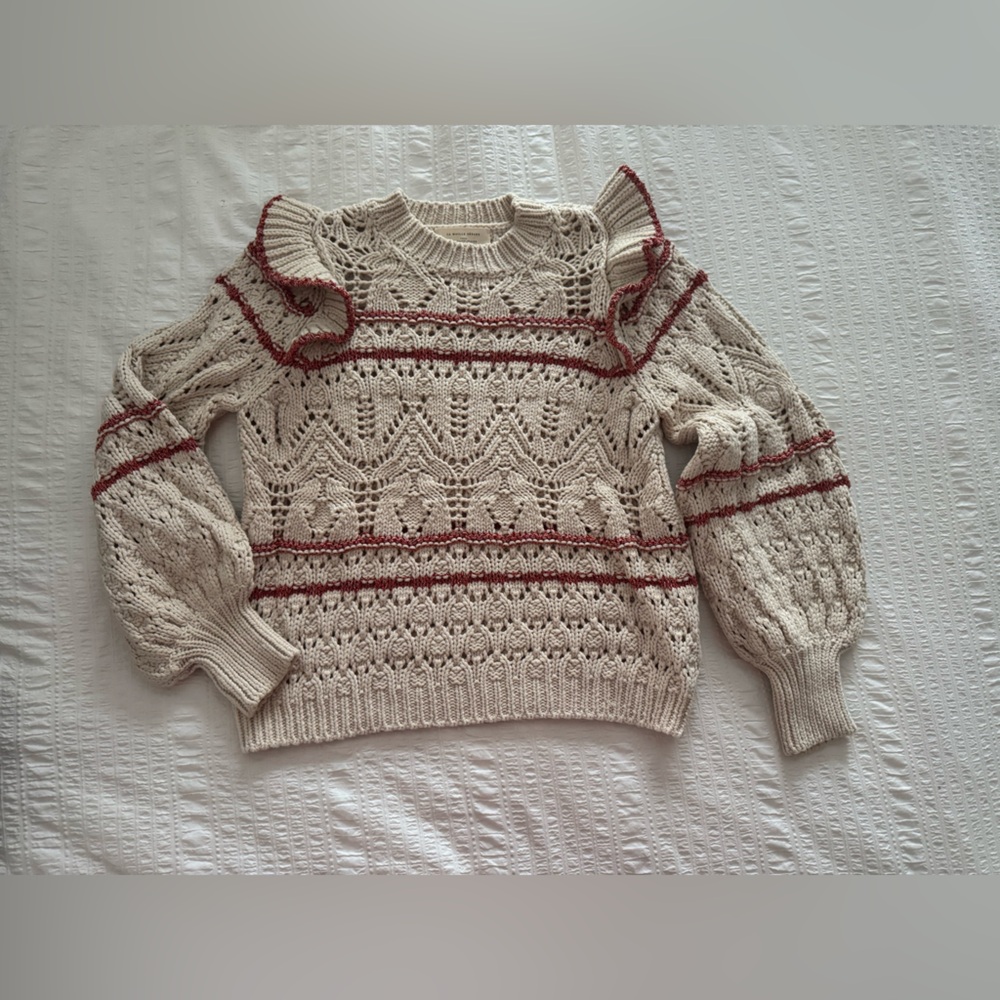 Sézane open knit ruffle sweater. Excellent condition. Size 2. Barely worn.